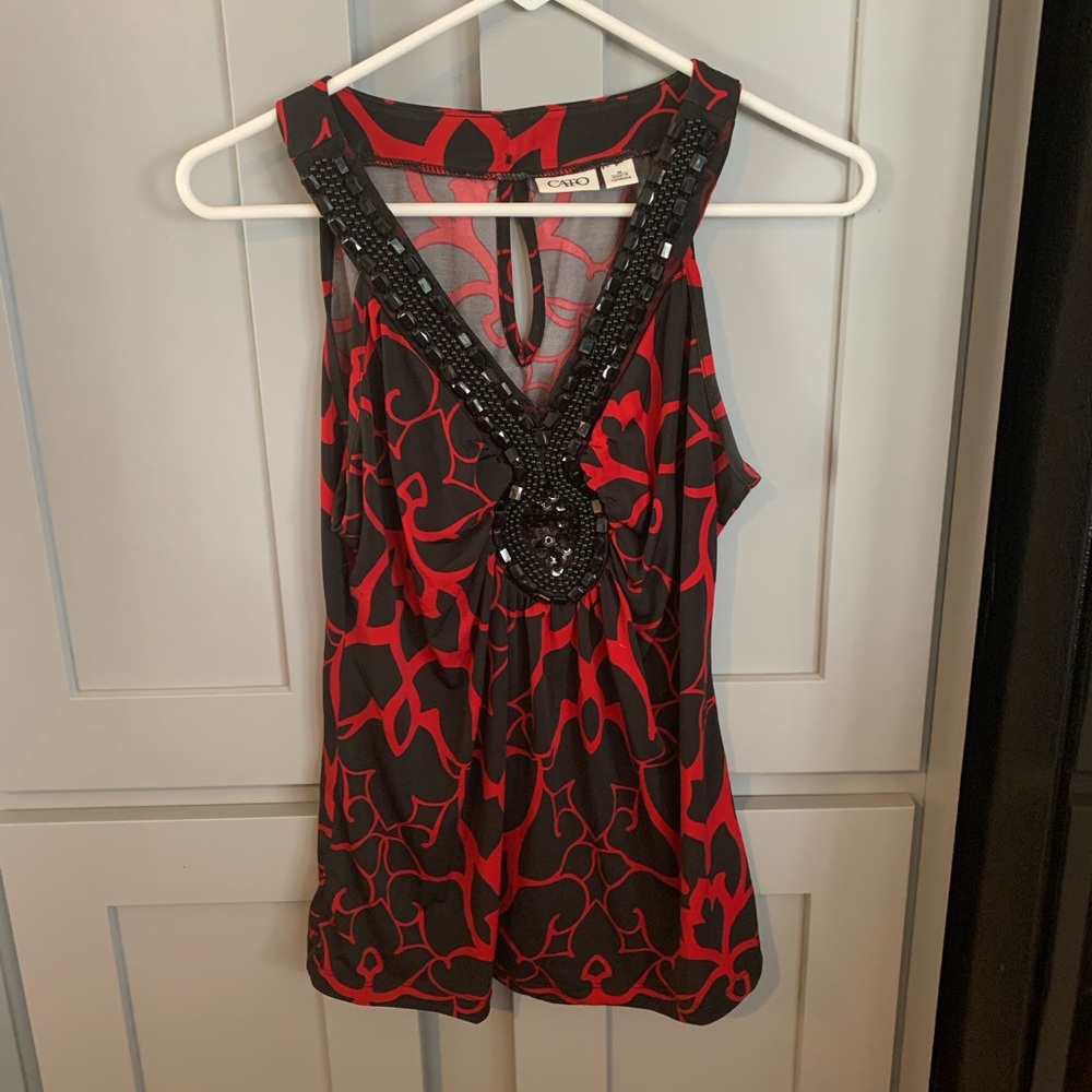 Cato’s black/red printed blouse with a beaded neck